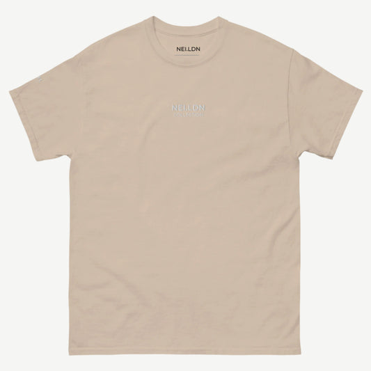 Sand Quiet Confidence Tee front view with white embroidered NEI.LDN logo