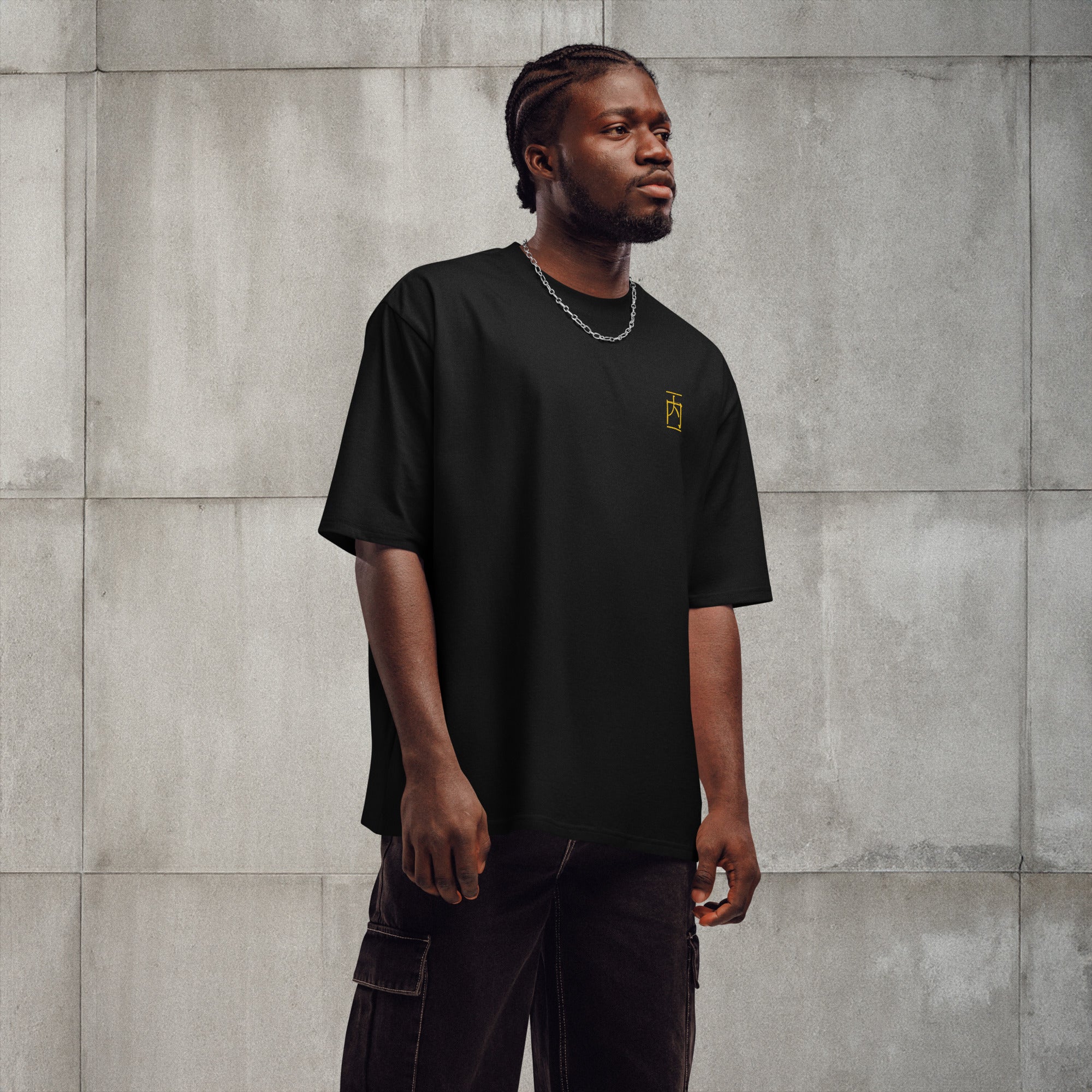 Quiet Flow black oversized drop shoulder t-shirt in premium carded cotton with gold embroidered NEI logo