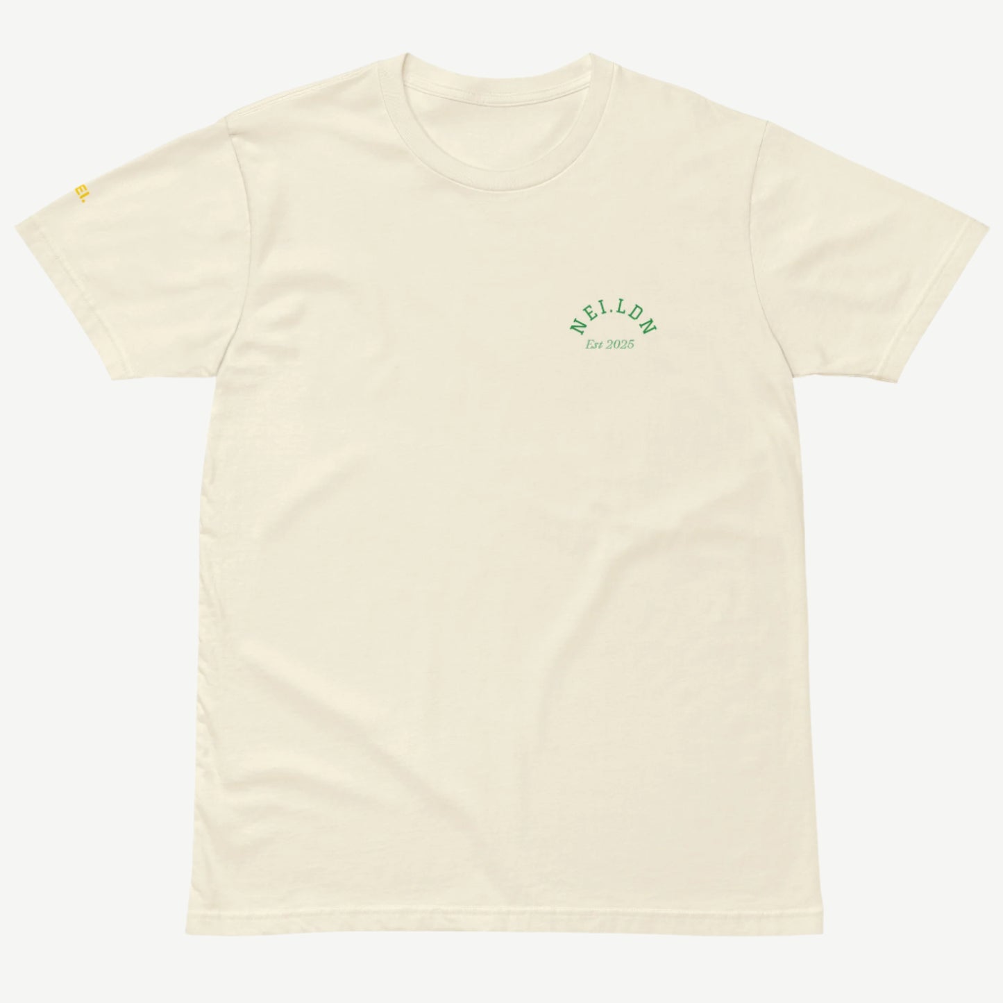 Comfort Premium Natural T-Shirt front view with green NEI.LDN logo and Est 2025 print
