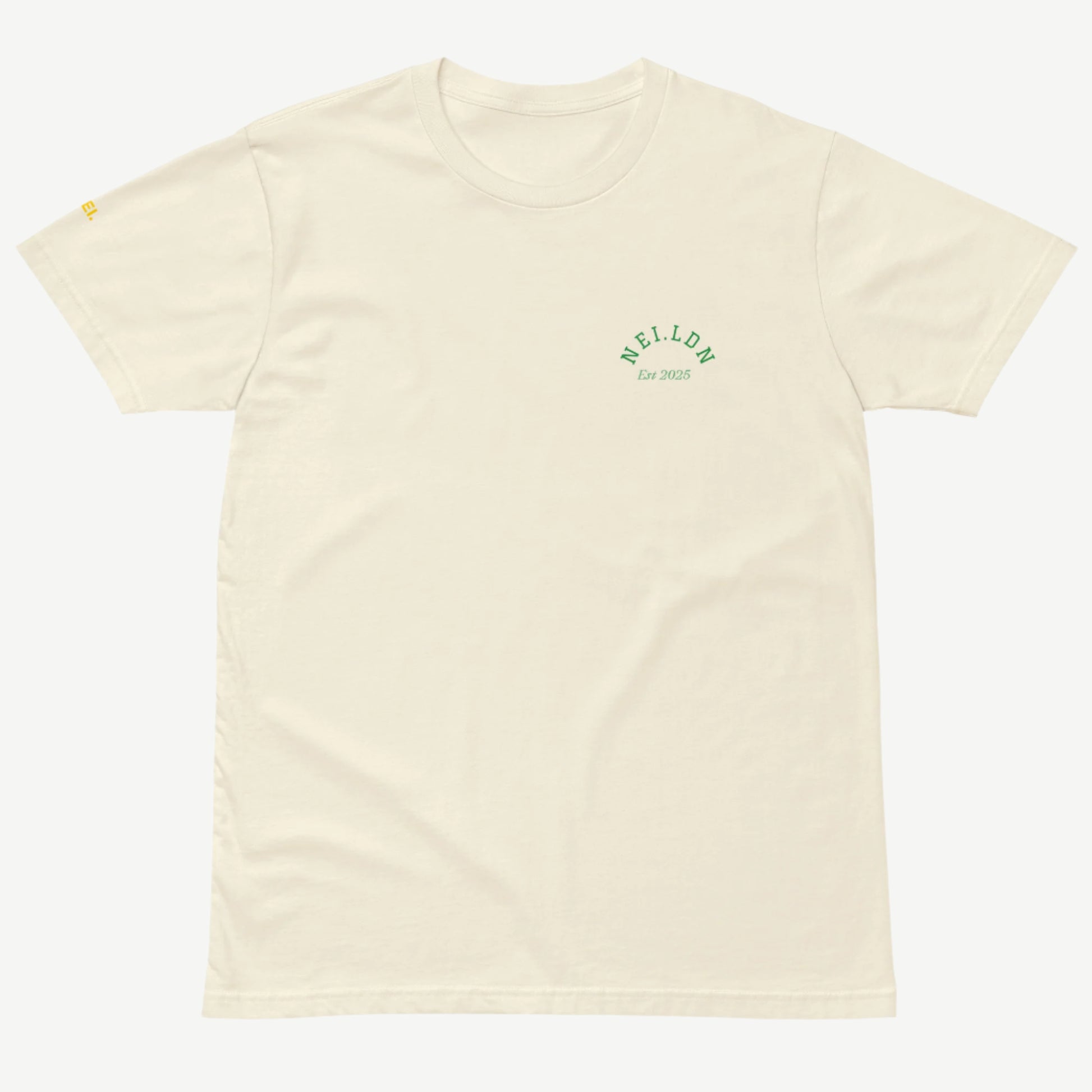 Comfort Premium Natural T-Shirt front view with green NEI.LDN logo and Est 2025 print